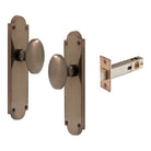 Oval Knob Plate Passage in Natural Bronze