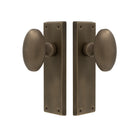 Oval Knob Latch in Roman Brass