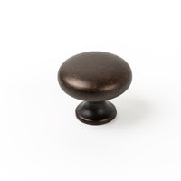 Momo DUKE round cabinet knob in brushed brass finish, featuring a sleek, minimalist design for modern furniture.