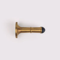 Wall Door Stop - Acid Washed Brass in Acid Washed Brass