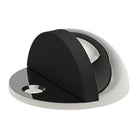 Style Finish Doorware dome door stop in polished stainless steel on a door threshold.