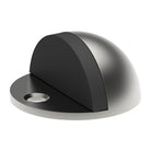 Stainless steel dome-shaped door stop by Style Finish Doorware mounted on a door base.