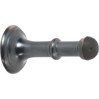 Tradco concealed fix door stop, 80mm length, with chrome finish, mounted on a door for preventing damage.