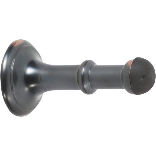 Tradco concealed fix door stop, 80mm length, with chrome finish, mounted on a door for preventing damage.