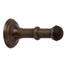 Tradco 80mm Concealed Fix Door Stop mounted on a door, showcasing its sleek, hidden design for door protection and stopping.