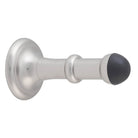 Tradco concealed fix door stop, 80mm, mounted on wall with metal finish, designed to prevent door damage.