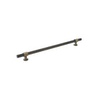 Momo BELGRAVIA 520mm knurled back-to-back entry pull handle mounted on door, made of durable metal with textured grip surface.
