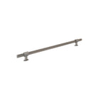 Momo Belgravia 520mm knurled back-to-back entry pull handle installed on a door, featuring textured metal design for secure grip.