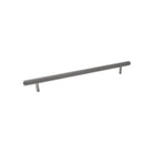 Momo Bellevue 600mm knurled entry pull handle mounted on door, featuring textured metal grip and sleek design.