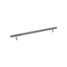 Momo BELLEVUE 600mm lined entry pull handle in dark bronze finish, mounted on door with textured surface.