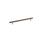 Momo BELLEVUE 496mm knurled back-to-back entry pull handle mounted on door with visible textured grip and mounting hardware.