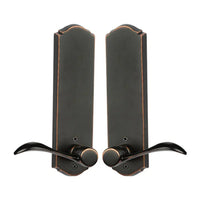 N2LOK Etna Wave Lever Passage Set on door, featuring modern wave lever handle and durable hardware for interior entrance use.