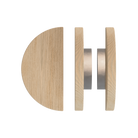 Pair of T02 Timber Pull Handles in Tasmanian Oak by Style Finish Doorware, showing smooth wooden handles on a door.