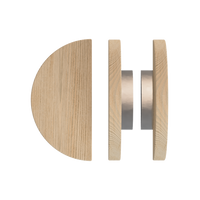Pair of T02 Timber Pull Handles in Tasmanian Oak by Style Finish Doorware, showing smooth wooden handles on a door.