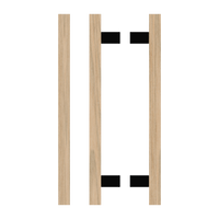 Pair of T06 Timber Pull Handles in Tasmanian Oak by Style Finish Doorware, featuring smooth wood grain and ergonomic design.