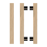 Pair of T07 Timber Pull Handles in Tasmanian Oak by Style Finish Doorware, showing the natural wood grain and sleek design.