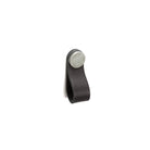 Momo FLEXA Leather Pull in black, featuring a sleek design with a polished brass finish, suitable for furniture handles.