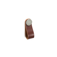 Momo FLEXA Leather Pull in dark brown with polished brass accents, designed for furniture drawer or cabinet handles.