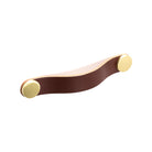 Momo FLEXA leather cabinet pull handle with dark brown leather and metal mounting hardware, designed for furniture drawers and cabinets.