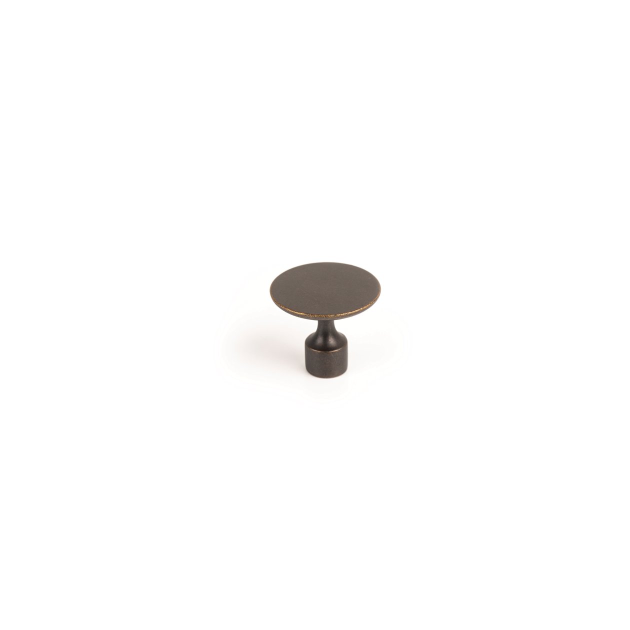 Momo FLOID cabinet knob in matte beige with sleek round design, mounted on a wooden cabinet door.