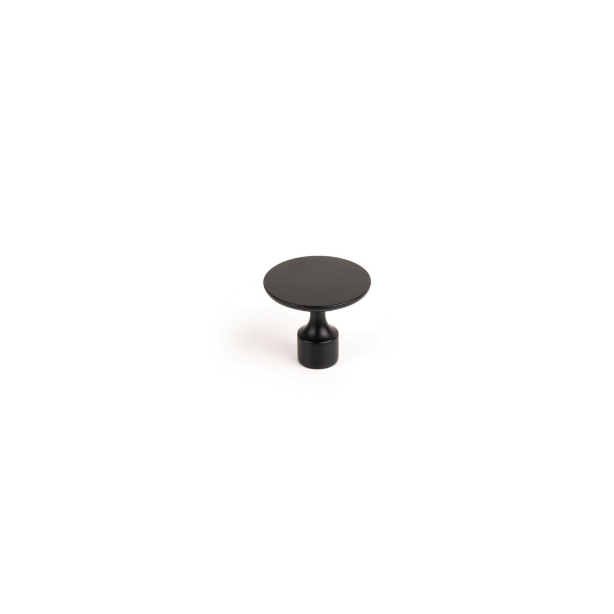 Momo FLOID cabinet knob in black, modern round design, mounted on a wooden cabinet door for stylish storage access.