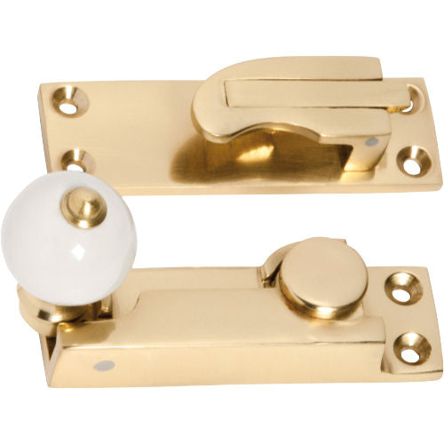 Sash Fastener Porcelain Ball Polished Brass L73xW26mm in Polished Brass