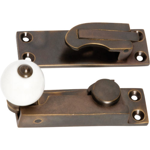 Sash Fastener Porcelain Ball Antique Brass L73xW26mm in Antique Brass