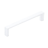 Momo DALLAS D cabinet pull handle in white with gold accents, sleek modern design, mounted on a cabinet door.