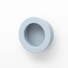Castella round flush pull handle, 40mm diameter, in a sleek metallic finish, suitable for cabinets and furniture.
