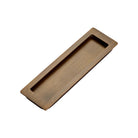 Momo sliding door flush pull handle in black finish, mounted on a modern interior door for smooth sliding operation