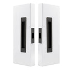 Windsor LUME sliding door flush pulls passage set with sleek dark bronze finish, installed on a modern interior door.