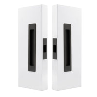 Windsor LUME sliding door flush pulls passage set with sleek dark bronze finish, installed on a modern interior door.