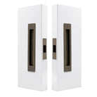 Windsor LUME sliding door flush pull passage set with a sleek red bronze finish, featuring modern design and smooth surface.