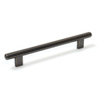 Momo HENDRIX cabinet pull handle in brushed aluminum with sleek, modern design on a wooden cabinet.