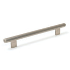 Momo Hendrix cabinet pull handle in dark bronze finish, showcasing sleek curved design on light wood cabinet surface.
