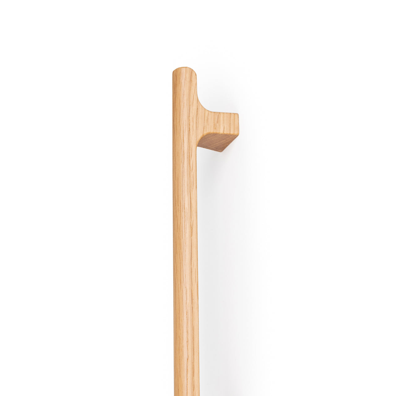 Momo HINOKI Big D timber cabinet pull handle in oak wood with a natural finish, mounted on a cabinet door.
