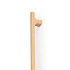 Momo HINOKI Big D timber cabinet pull handle in oak wood with a natural finish, mounted on a cabinet door.