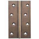 Tradco fixed pin hinge with sturdy metal construction, showing a close-up of the hinge's pin and mounting plates.