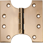 Tradco Shutter Parliament Hinge showing metal hinges attached to wooden shutter panels for window or door installation.