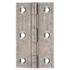 Tradco fixed pin hinge showing metal construction with pin and hinge plates for durable door or window installation.