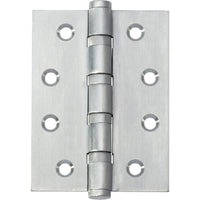 Tradco ball bearing hinge showing metal construction and mounting plates, designed for smooth door operation and durability
