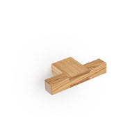 Momo HAKO cabinet with T-pull handle in oak finish, showcasing sleek modern design and natural wood grain detail.