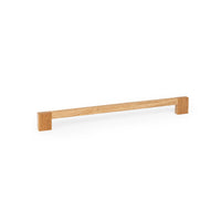 Momo HAKO timber cabinet pull handle in oak wood finish, featuring a sleek, modern design for kitchen or furniture drawers