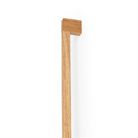 Momo HAKO Big D Timber Cabinet Pull Handle in oak wood with a sleek, modern design for kitchen or furniture cabinetry.