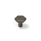 Momo Hendrix cabinet knob in brushed antique brass finish, round metal handle for kitchen or furniture drawers.