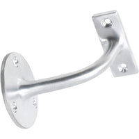 Tradco handrail brackets mounted on a wooden staircase railing, showcasing sturdy metal construction and classic design.