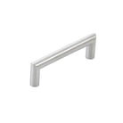 Stainless steel Momo BERGAMO cabinet pull handle with sleek, modern design, mounted on a cabinet door.