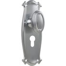 Pair of Tradco Bungalow knobs with long backplates, featuring vintage-style brass handles for cabinet or door use.