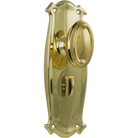 Pair of Tradco Bungalow Knobs on long backplates, featuring vintage-style brass door handles and decorative hardware.
