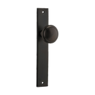 Pair of Iver Paddington knobs on rectangular backplates, stylish architectural hardware for doors, featuring a polished metal finish.